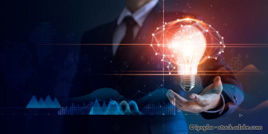 Businessman holding light bulb and brain network with icon business and technology, innovative in futuristic, network connection on interface background, abstract, innovation and technologies.